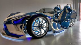 Slingshot car with futuristic lighting and color scheme